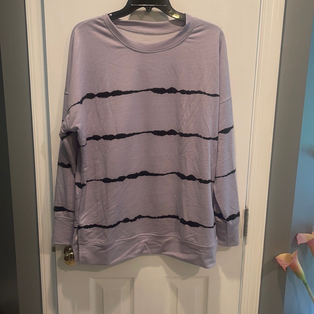 Never worn Shirt size medium